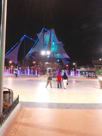 One of the many squares where people gather to relax- they are wired for sound playing all day nice Musac sounds